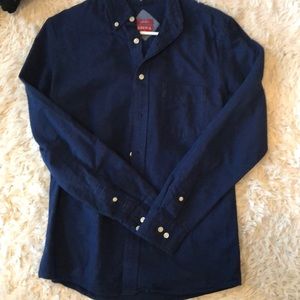Dark blue long sleeve collared button down